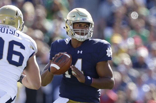 Notre Dame quarterback DeShone Kizer (14) throws against Georgia Tech during the first half of an NCAA college football game in South Bend, Ind., Saturday, Sept. 19, 2015. (AP Photo/Michael Conroy)