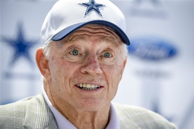 Dallas Cowboys owner Jerry Jones answers a question during the