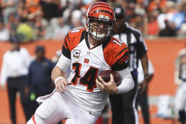 Cincinnati Bengals quarterback Andy Dalton runs the ball in the second half of an NFL football game against the San Diego Chargers, Sunday, Sept. 20, 2015, in Cincinnati. (AP Photo/Frank Victores)
