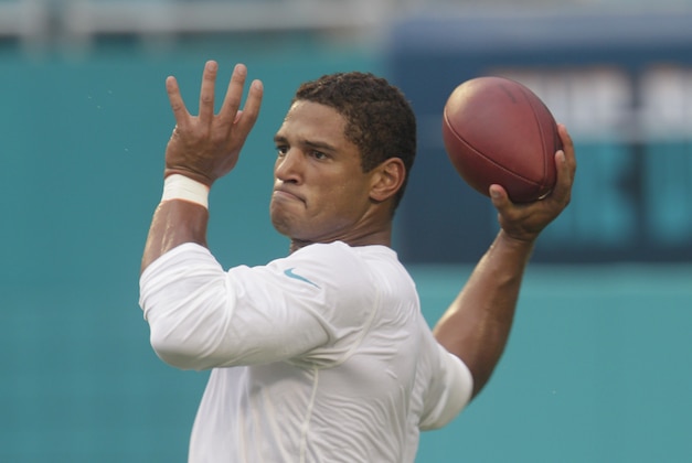 Aug 29, 2015; Miami Gardens, FL, USA; Miami Dolphins quarterback Josh Freeman (5) throws a pass during pre game warmups before an NFL preseason football game against the Atlanta Falcons at Sun Life Stadium. Mandatory Credit: Reinhold Matay-USA TODAY Sports