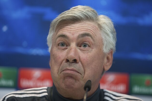 Real Madrid's coach Carlo Ancelotti reacts to a question during a press conference in Madrid, Spain Tuesday April 21, 2015. Real Madrid will play Atletico Madrid Wednesday in a Champions League quarterfinal second leg soccer match in Madrid.(AP Photo/Paul White)