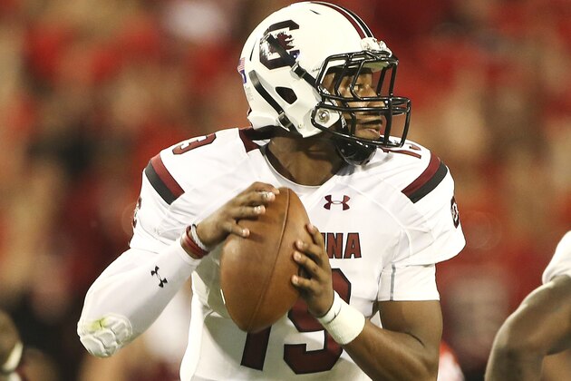 South Carolina quarterback Lorenzo Nunez (19) drops to throw in the second half of an NCAA college football game against Georgia Saturday, Sept. 19, 2015, in Athens, Ga. (AP Photo/John Bazemore)