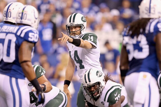 INDIANAPOLIS, IN - SEPTEMBER 21:  Ryan Fitzpatrick #14 of the New York Jets  gives instructions to his team during the game against the Indianapolis Colts during the game at Lucas Oil Stadium on September 21, 2015 in Indianapolis, Indiana.  (Photo by Andy Lyons/Getty Images)