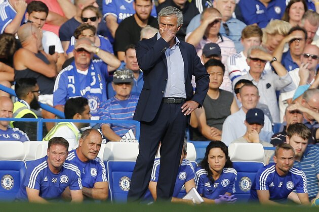 Chelsea's manager Jose Mourinho and team doctor Eva Carneiro, third from right, during the English Premier League soccer match between Chelsea and Swansea City at Stamford Bridge stadium in London, Saturday, Aug. 8, 2015.(AP Photo/Frank Augstein)