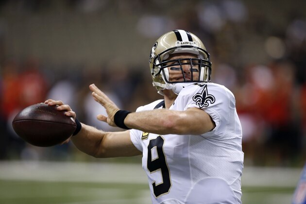 New Orleans Saints quarterback Drew Brees (9) warms up before an NFL football game against the Tampa Bay Buccaneers in New Orleans, Sunday, Sept. 20, 2015. (AP Photo/Jonathan Bachman)