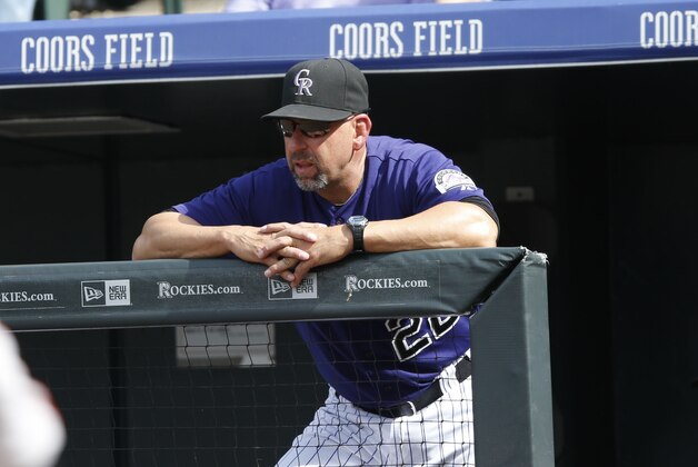 Colorado Rockies manager Walt Weiss (22) looks on in the fourth inning of a baseball game Sunday, Sept. 6, 2015, in Denver. San Francisco won 7-4. (AP Photo/David Zalubowski)