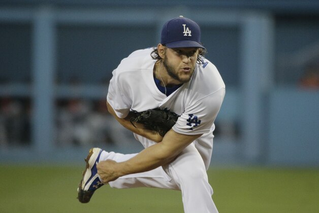 Los Angeles Dodgers starting pitcher Clayton Kershaw throws against the San Francisco Giants during the first inning of a baseball game, Wednesday, Sept. 2, 2015, in Los Angeles. (AP Photo/Jae C. Hong)