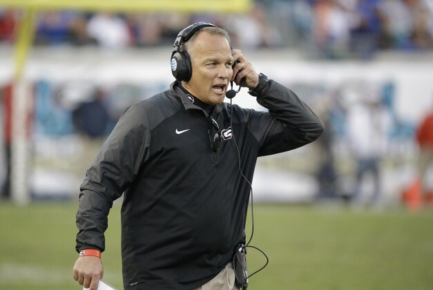 Georgia head coach Mark Richt yells to an official during the second half of an NCAA college football game in Jacksonville, Fla., Saturday, Nov. 1, 2014. Florida won 38-20. (AP Photo/John Raoux)