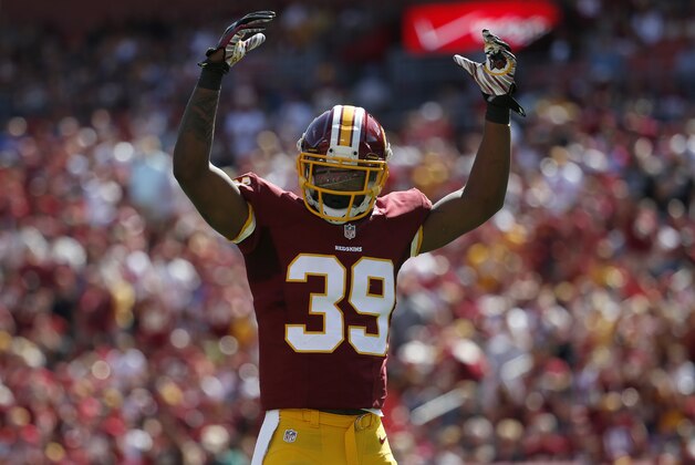 Washington Redskins cornerback David Amerson (39) reacts during the first half of an NFL football game against the Jacksonville Jaguars Sunday, Sept. 14, 2014, in Landover, Md. (AP Photo/Evan Vucci)