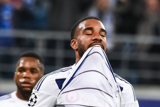 Lyon's Alexandre Lacazette reacts after he missed a penalty during the Champions League Group H soccer match between KAA Gent and Lyon at the Ghelamco Arena in Gent, Belgium, Wednesday, Sept. 16, 2015. (AP Photo/Geert Vanden Wijngaert)