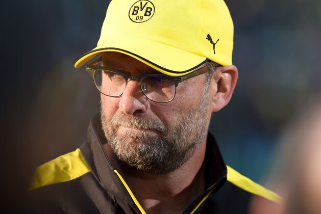 Dortmund's head coach Juergen Klopp reacts before the start of the German Cup DFB Pokal final football match between BVB Borussia Dortmund and VfL Wolfsburg at the Olympic Stadium in Berlin on May 30, 2015.  AFP PHOTO / PATRIK STOLLARZ        (Photo credit should read PATRIK STOLLARZ/AFP/Getty Images)