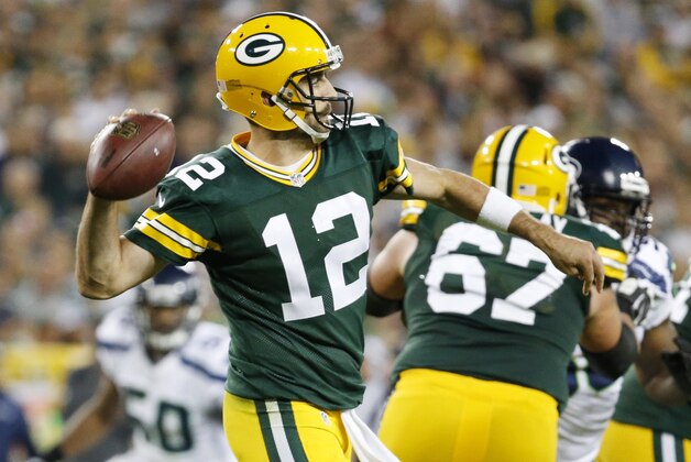 Green Bay Packers' Aaron Rodgers during the first half of an NFL football game against the Seattle Seahawks Sunday, Sept. 20, 2015, in Green Bay, Wis. (AP Photo/Mike Roemer)