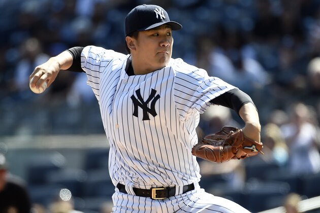 New York Yankees starter Masahiro Tanaka pitches in the first inning of a baseball game against the Toronto Blue Jays at Yankee Stadium, Sunday, Sept. 13, 2015, in New York. The Yankees won 5-0. (AP Photo/Kathy Kmonicek)