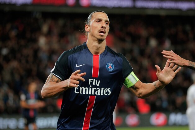 PSG's Zlatan Ibrahimovic celebrates after scoring, during the French League One soccer match between Paris Saint Germain and Guingamp, at the Parc des Princes stadium in Paris, France, Tuesday, Sept. 22, 2015. (AP Photo/Thibault Camus)