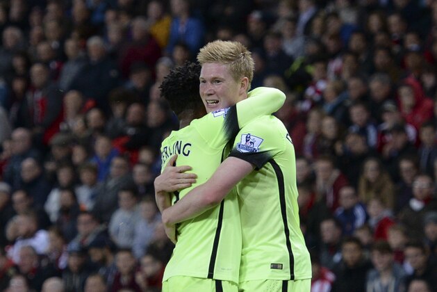 Manchester City's English midfielder Raheem Sterling (L) celebrates with Manchester City's Belgian midfielder Kevin De Bruyne (R) after De Bruyne scored Manchester CIty's second goal during the English League Cup third round football match between Sunderland and Manchester City at the Stadium of Light in Sunderland, northest England, on September 22, 2015. AFP PHOTO / OLI SCARFF

RESTRICTED TO EDITORIAL USE. No use with unauthorized audio, video, data, fixture lists, club/league logos or 'live' services. Online in-match use limited to 75 images, no video emulation. No use in betting, games or single club/league/player publications.        (Photo credit should read OLI SCARFF/AFP/Getty Images)