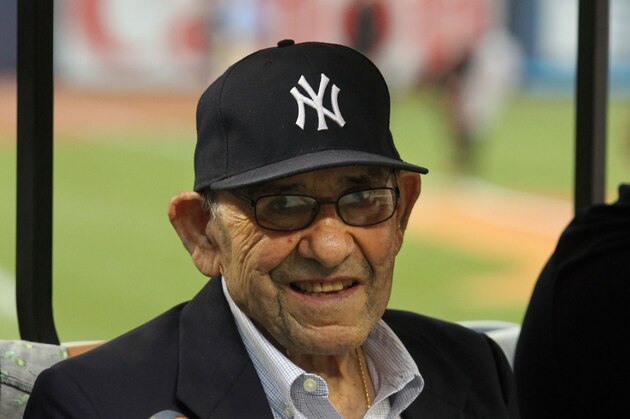 Aug 30, 2013; Bronx, NY, USA; New York Yankees former player Yogi Berra displays a bobble head figure in his likeness before a game against the Baltimore Orioles at Yankee Stadium. Mandatory Credit: Brad Penner-USA TODAY Sports