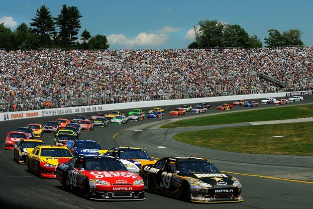 LOUDON, NH - JULY 17:  Ryan Newman, driver of the #39 U.S. Army Chevrolet, and Tony Stewart, driver of the #14 Office Depot/Mobil 1 Chevrolet, lead the field to the green flag to start the NASCAR Sprint Cup Series LENOX Industrial Tools 301 at New Hampshire Motor Speedway on July 17, 2011 in Loudon, New Hampshire.  (Photo by Jared C. Tilton/Getty Images)
