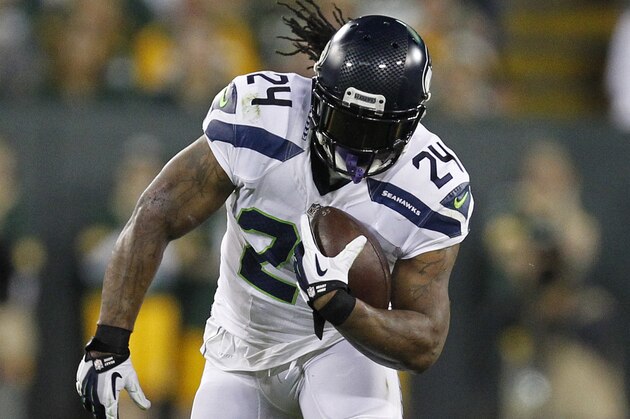Seattle Seahawks running back Marshawn Lynch rushes against the Green Bay Packers during an NFL football game Sunday Sept. 20, 2015, in Green Bay, Wis. (AP Photo/Matt Ludtke)