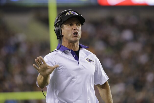 Baltimore Ravens head coach John Harbaugh in action during the first half of a preseason NFL football game against the Philadelphia Eagles, Saturday, Aug. 22, 2015, in Philadelphia. (AP Photo/Matt Rourke)