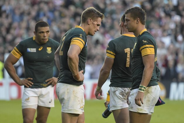 South Africa's captain and centre Jean de Villiers (C) reacts after losing the Pool B match of the 2015 Rugby World Cup between South Africa and Japan at the Brighton community stadium in Brighton, south east England on September 19, 2015. Japan won 34-32. AFP PHOTO / LIONEL BONAVENTURE

RESTRICTED TO EDITORIAL USE, NO USE IN LIVE MATCH TRACKING SERVICES, TO BE USED AS NON-SEQUENTIAL STILLS        (Photo credit should read LIONEL BONAVENTURE/AFP/Getty Images)
