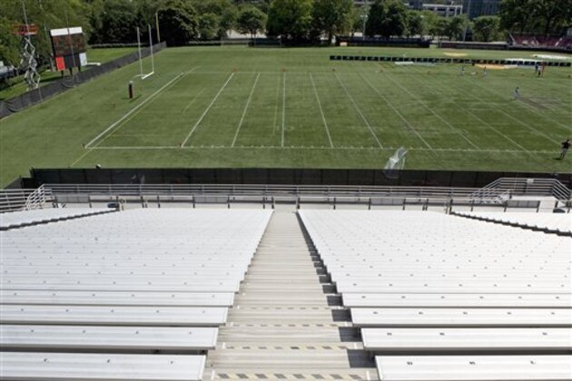 View of football field from empty bleachers (Photo by: Tetra Images/AP Images)