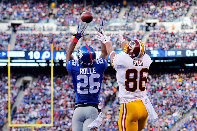 EAST RUTHERFORD, NJ - DECEMBER 14:  (NEW YORK DAILIES OUT)    Antrel Rolle #26 of the New York Giants breaks up a pass intended for Jordan Reed #86 of the Washington Redskins on December 14, 2014 at MetLife Stadium in East Rutherford, New Jersey. The Giants defeated the Redskins 24-13.  (Photo by Jim McIsaac/Getty Images)