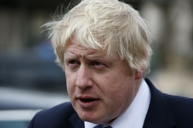 London Mayor Boris Johnson speaks with the media before a visit to the Smithsonian National Air and Space Museum, Thursday, Feb. 12, 2015 in Washington. (AP Photo/Alex Brandon)