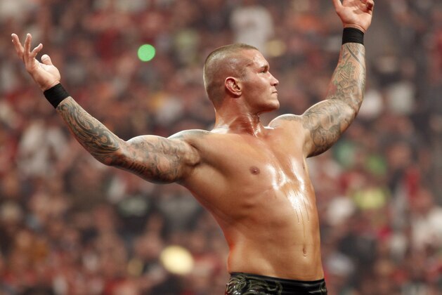 WWE Superstar Randy Orton celebrates victory during WrestleMania XXVI on March 28, 2010, at University of Phoenix Stadium in Glendale, Arizona. (AP Photo/Rick Scuteri)