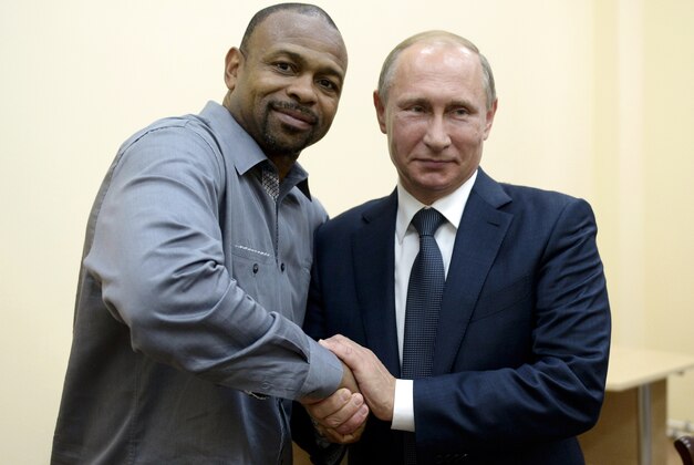 FILE - In this Wednesday, Aug. 19, 2015 file photo, Russian President Vladimir Putin meets with American boxer Roy Jones Jr. in Sevastopol, Crimea. Vladimir Putin has given Russian citizenship to former world heavyweight boxing champion Roy Jones Jr. A decree published on the Kremlin's website in the Russian president's name Saturday, Sept. 12, 2015 said the American, a four-weight champion once regarded by many as the world's best boxer, had been given Russian nationality. Jones asked Putin for citizenship in August over a cup of tea when they met in Crimea — the territory annexed by Russia last year — saying it would make doing business in Russia much easier. (Alexei Nikolsky/RIA-Novosti, Kremlin Pool Photo via AP, file)