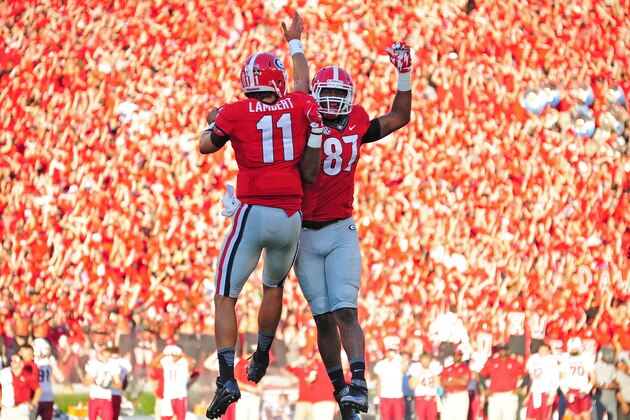 ATHENS, GA - SEPTEMBER 19: Greyson Lambert #11 of the Georgia Bulldogs celebrates with Jay Rome #87 after a second quarter touchdown against South Carolina Gamecocks on September 19, 2015 in Atlanta, Georgia. Photo by Scott Cunningham/Getty Images)