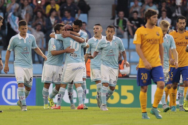 RC Celta’s Manuel Agudo “Nolito”  is congratulated by teammates after scoring the first goal during a Spanish La Liga soccer match between RC Celta and FC Barcelona, at the Balaídos stadium in Vigo, Spain, wednesday, September 23, 2015. (AP Photo/Lalo R. Villar)