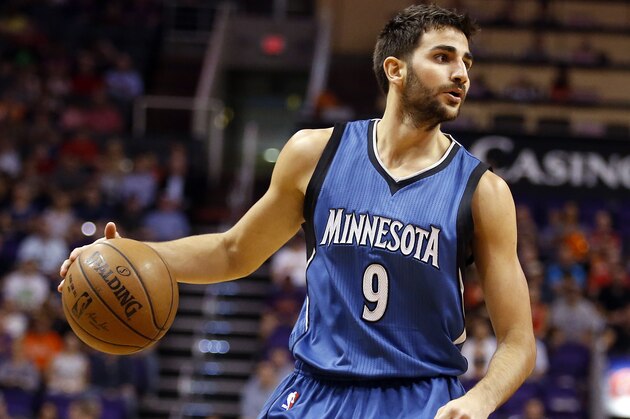 Minnesota Timberwolves guard Ricky Rubio (9) drives against the Phoenix Suns in the first quarter during an NBA basketball game, Wednesday, March 11, 2015, in Phoenix. (AP Photo/Rick Scuteri)