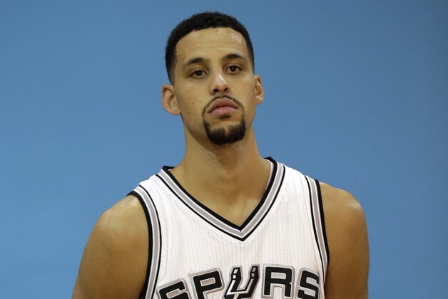San Antonio Spurs' Austin Daye poses for photos during an NBA basketball media day at the team's practice facility, Friday, Sept. 26, 2014, in San Antonio. (AP Photo/Eric Gay)