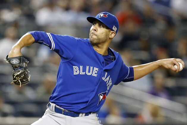 Toronto Blue Jays starting pitcher David Price delivers in the fifth inning of baseball game against the New York Yankees at Yankee Stadium in New York, Friday, Sept. 11, 2015. (AP Photo/Kathy Willens)