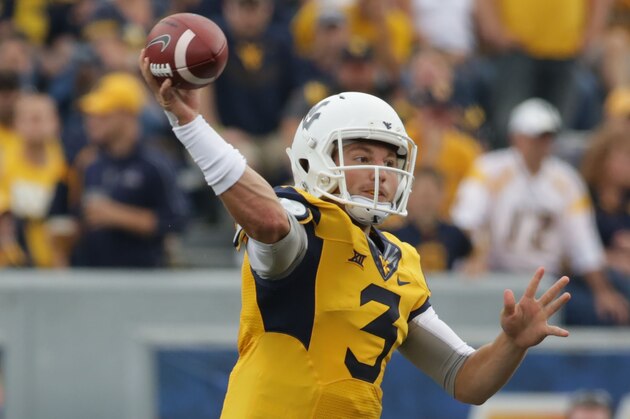 West Virginia quarterback Skyler Howard (3) during the first half/ second half of a NCAA college football game, Saturday, Sept. 12, 2015, in Morgantown, W.Va. (AP Photo/Raymond Thompson)