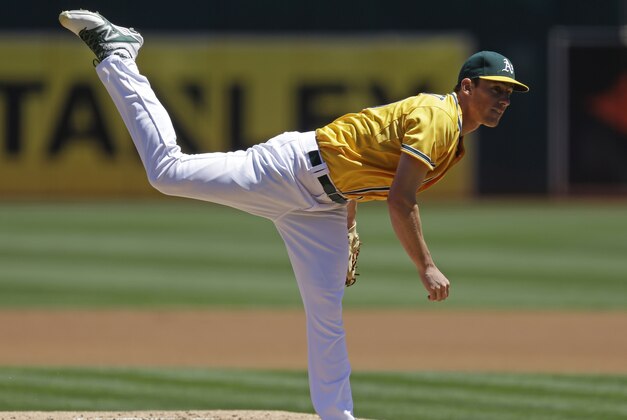 Oakland Athletics pitcher Chris Bassitt works against the Houston Astros in the first inning of a baseball game Sunday, Aug. 9, 2015, in Oakland, Calif. (AP Photo/Ben Margot)
