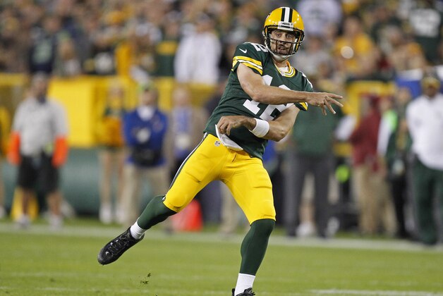 Green Bay Packers quarterback Aaron Rodgers looks to pass against the Seattle Seahawks during an NFL football game Sunday Sept. 20, 2015, in Green Bay, Wis. (AP Photo/Matt Ludtke)