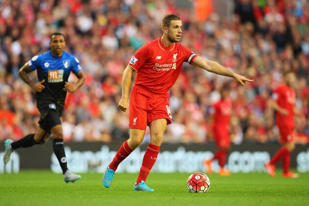 LIVERPOOL, ENGLAND - AUGUST 17:  Jordan Henderson of Liverpool signals as he runs with the ball during the Barclays Premier League match between Liverpool and A.F.C. Bournemouth at Anfield on August 17, 2015 in Liverpool, United Kingdom.  (Photo by Alex Livesey/Getty Images)