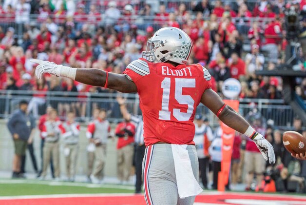 Sep 12, 2015; Columbus, OH, USA; Ohio State Buckeyes running back Ezekiel Elliott (15) celebrates his third touchdown during the game against the Hawaii Warriors at Ohio Stadium. The Ohio State Buckeyes beat the Hawaii Warriors by the score of 38-0. Mandatory Credit: Trevor Ruszkowski-USA TODAY Sports