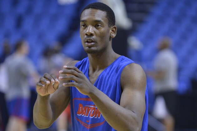 Mar 19, 2014; Buffalo, NY, USA; Dayton Flyers forward Dyshawn Pierre (21) warms up during practice before the second round of the 2014 NCAA Tournament at First Niagara Center. Mandatory Credit: Mark Konezny-USA TODAY Sports Mar 19, 2014; Buffalo, NY, USA; Dayton Flyers forward Dyshawn Pierre (21) warms up during practice before the second round of the 2014 NCAA Tournament at First Niagara Center. Mandatory Credit: Mark Konezny-USA TODAY Sports