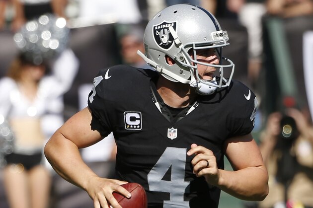 Oakland Raiders quarterback Derek Carr during an NFL football game against the Baltimore Ravens Sunday, Sept. 20, 2015, in Oakland , Calif. (AP Photo/Tony Avelar)