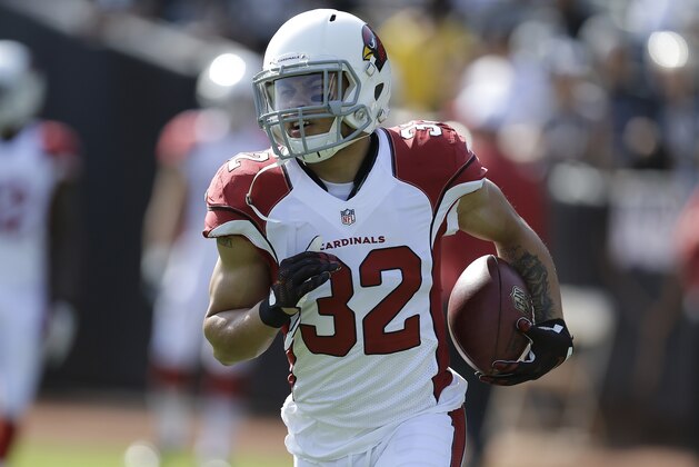 Arizona Cardinals free safety Tyrann Mathieu (32) warms up before an NFL preseason football game against the Oakland Raiders in Oakland, Calif., Sunday, Aug. 30, 2015. (AP Photo/Ben Margot)