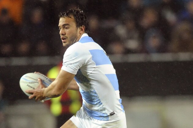 Argentina's Juan Martin Hernandez runs out of the tackle of New Zealand's Conrad Smith during a match of the Rugby Championship at Waikato Stadium, Hamilton, New Zealand, Saturday, Sept. 7, 2013. (AP Photo/SNPA, Ross Setford) NEW ZEALAND OUT