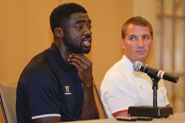 Liverpool Football Club defender Kolo Toure, left, and manager Brendan Rodgers answer questions during a news conference, Tuesday, July 29, 2014, in New York. Liverpool will take on Manchester City Football Club at Yankee Stadium on Wednesday in the Guinness International Champions Cup. (AP Photo/Julie Jacobson)