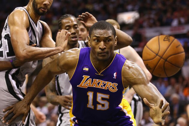 SAN ANTONIO, TX - APRIL 21:  Metta World Peace #15 of the Los Angeles Lakers during Game One of the Western Conference Quarterfinals of the 2013 NBA Playoffs at  at AT&T Center on April 21, 2013 in San Antonio, Texas. NOTE TO USER: User expressly acknowledges and agrees that, by downloading and or using this photograph, User is consenting to the terms and conditions of the Getty Images License Agreement.  (Photo by Ronald Martinez/Getty Images)