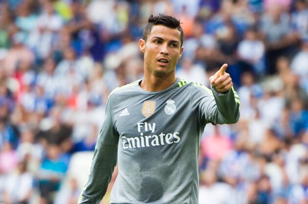 BARCELONA, SPAIN - SEPTEMBER 12: Cristiano Ronaldo of Real Madrid CF celebrates after scoring his team's fifth goal during the La Liga match between RCD Espanyol and Real Madrid CF at Cornella-El Prat Stadium on September 12, 2015 in Barcelona, Spain. (Photo by Alex Caparros/Getty Images)