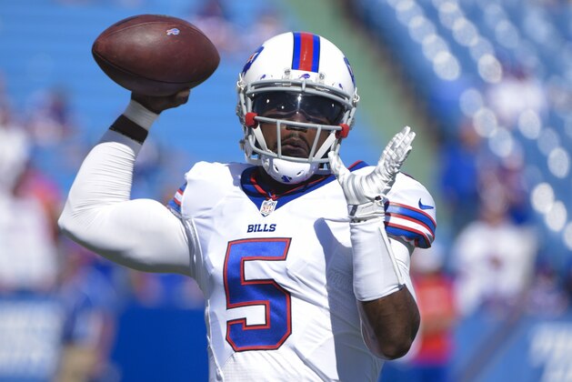 Buffalo Bills quarterback Tyrod Taylor (5) throws a pass before an NFL football game bagainst the New England Patriots Sunday, Sept. 20, 2015, in Orchard Park, N.Y. (AP Photo/Gary Wiepert)