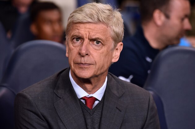 Arsenal's French manager Arsene Wenger awaits kick off in the English League Cup third round football match between Tottenham Hotspur and Arsenal at White Hart Lane in north London on September 23, 2015. AFP PHOTO / BEN STANSALL

RESTRICTED TO EDITORIAL USE. No use with unauthorized audio, video, data, fixture lists, club/league logos or 'live' services. Online in-match use limited to 75 images, no video emulation. No use in betting, games or single club/league/player publications.        (Photo credit should read BEN STANSALL/AFP/Getty Images)