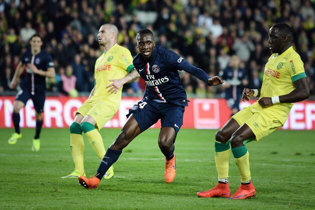 Paris Saint-Germain's midfielder Blaise Matuidi (C) celebrates after scoring a goal during the French L1 football match between Nantes (FCN) and Paris-Saint-Germain (PSG) on May 3, 2015 at the Beaujoire stadium in Nantes, western France. AFP PHOTO / JEAN-SEBASTIEN EVRARD        (Photo credit should read JEAN-SEBASTIEN EVRARD/AFP/Getty Images)