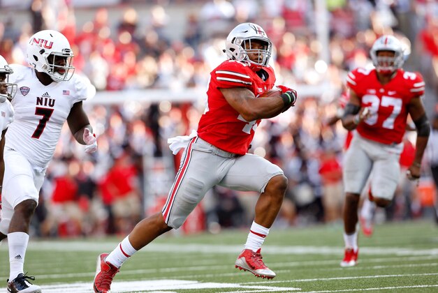 Sep 19, 2015; Columbus, OH, USA; Ohio State Buckeyes linebacker Darron Lee (43) returns the interception for a touchdown during the second half versus the Northern Illinois Huskies at Ohio Stadium. Ohio State won the game 20-13. Mandatory Credit: Joe Maiorana-USA TODAY Sports